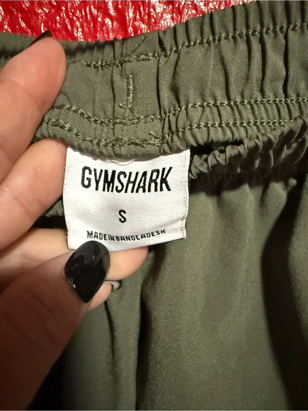 27. Preloved Men’s Gymshark Olive Green Athletic Drawstring Shorts